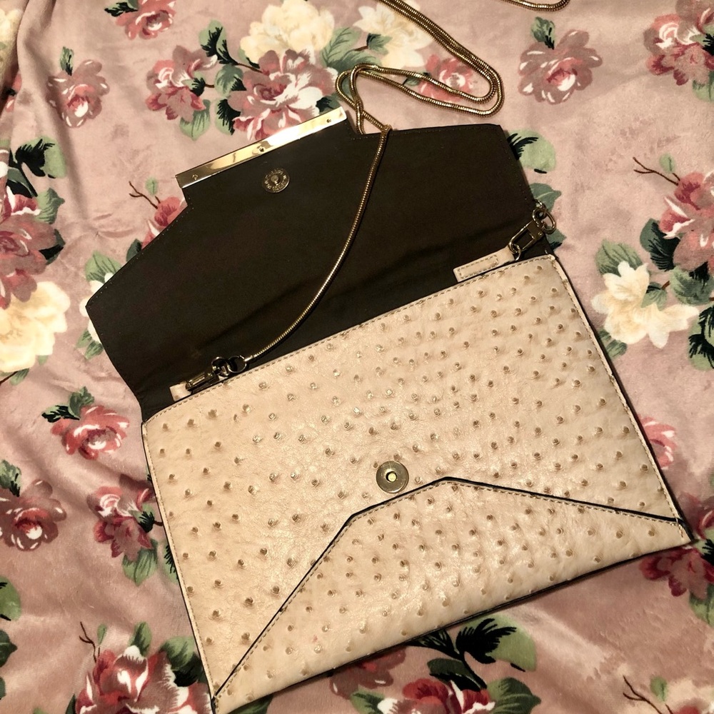 Ostrich tan hand bag with gold hardware and chain